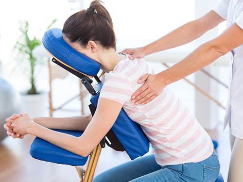 Séance de massage amma assis